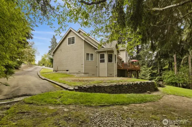 The extended driveway offers ideal RV parking, complete with its own dump station for added convenience.