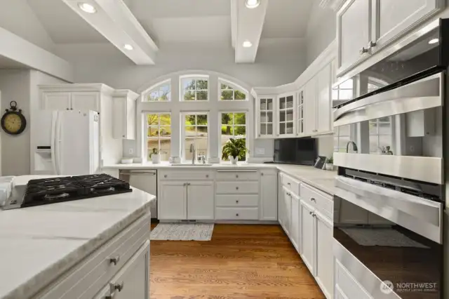 Sunlight pours in through the south-facing kitchen, filling the home with golden morning light.