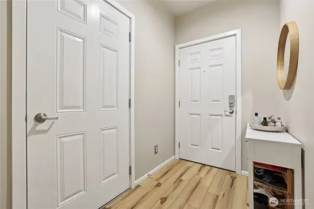Foyer with garage door on left