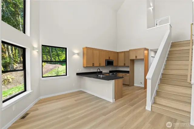 Open Concept Kitchen with Lake facing dining area to enjoy the fantastic views.
