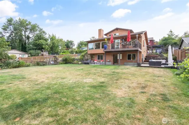 Large fully fenced flat back yard.