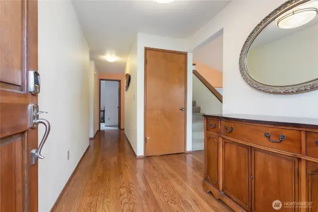 Enter and be greeted by warm hardwood floors.