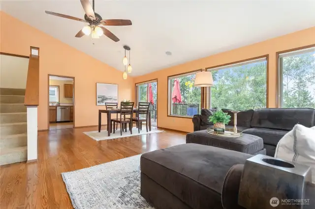 A nice open layout with a dining space and sliding glass doors out to the deck.