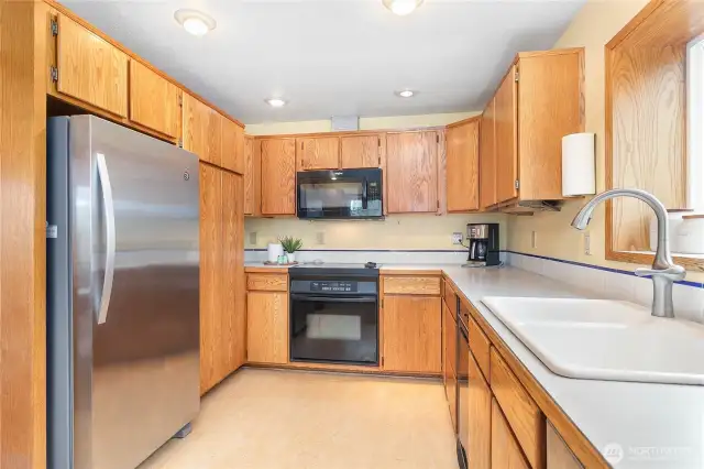 Spacious kitchen with plenty of storage.