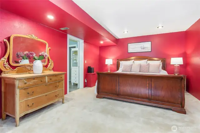 Lower level primary suite with large ensuite bathroom, walk-in closet - and an office!