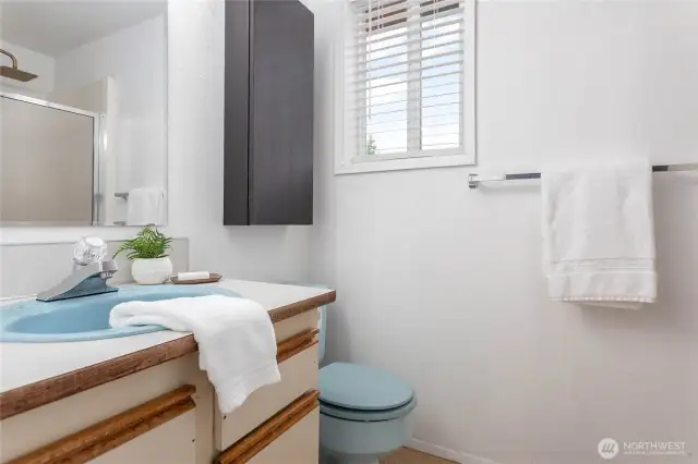 Upper level primary on-suite 3/4 bathroom.
