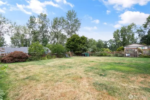 Fully fenced, with landscaping.