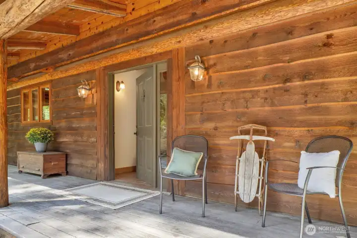 A large covered porch greets you as you enter the beautiful home