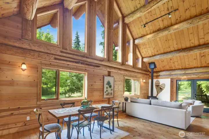 Enter the great room and be stunned by the vaulted ceilings and wall of windows. So much light!