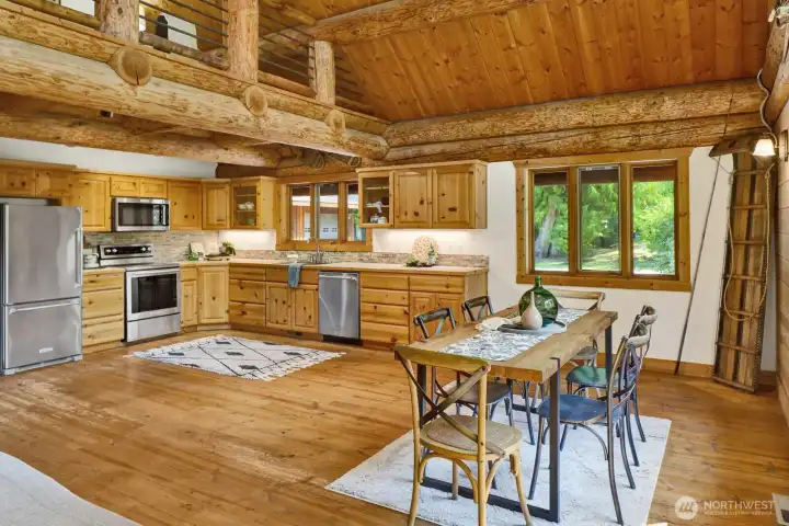 Another view of the dining room/ kitchen