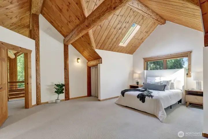 Another view of the primary bedroom looking towards the loft/ office area