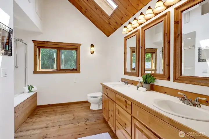 The primary suite bathroom does not disappoint with a double vanity and lots of space