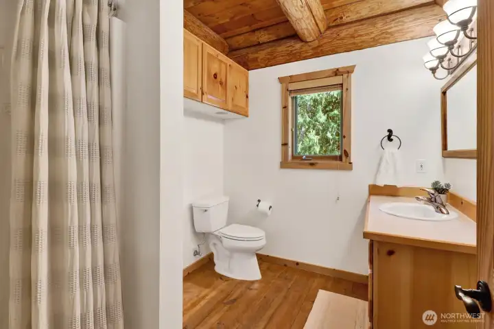 The main level features a full bathroom