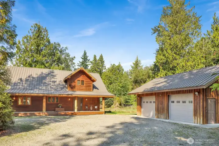 The home and shop are a beautiful example of log-accent construction