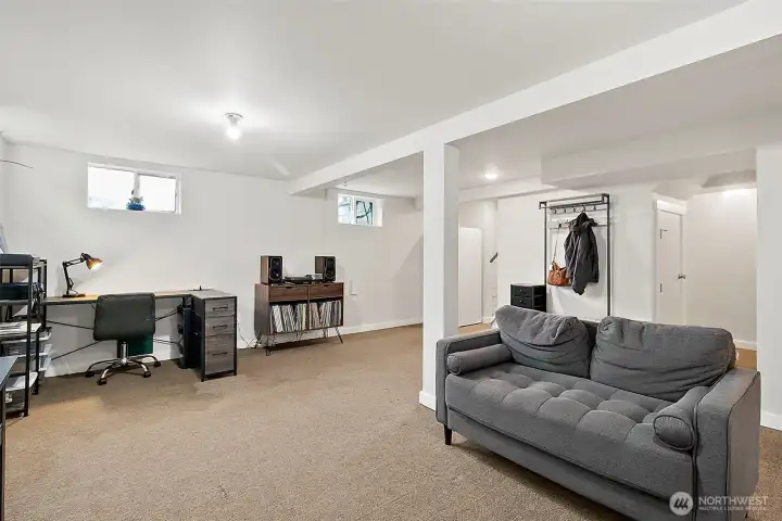 Tall ceilings make this space feel large and not like a basement!