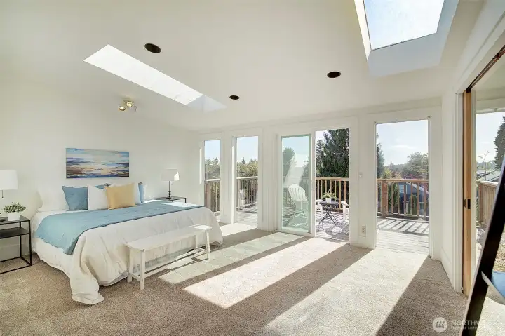 Dreamy and serene retreat! Let the sun stream in or listen to the rain on the skylights!