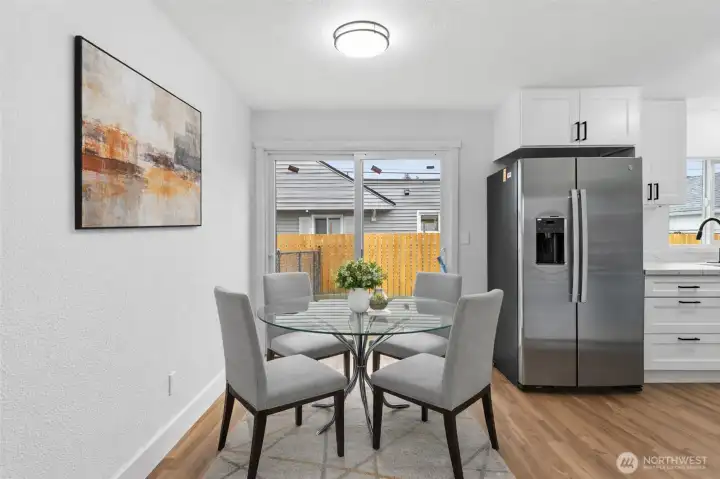 Dining set is virtually staged.