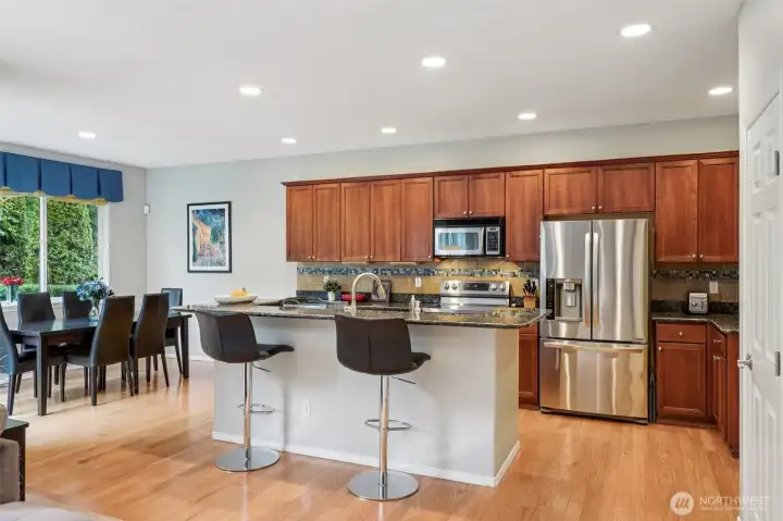 Elevated bar connecting kitchen and living room.