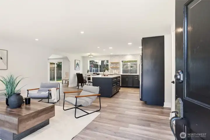 Natural light fills this living space, creating a bright and comfortable place to relax.