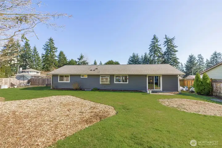 So much space to play, garden, or simply enjoy the backyard.