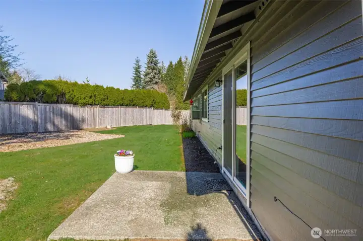 The fenced yard creates a private outdoor space to enjoy.