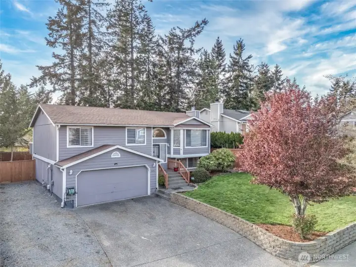 Huge garage with parking for an additional 4 cars and RV