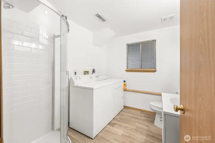 Downstairs three quarter bath and laundry room
