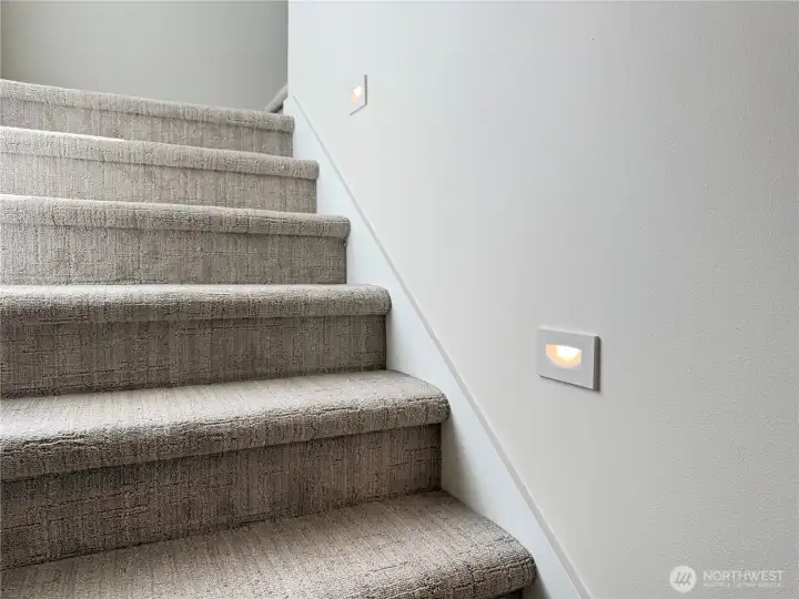 Stair lights create a cozy night light in the evening.