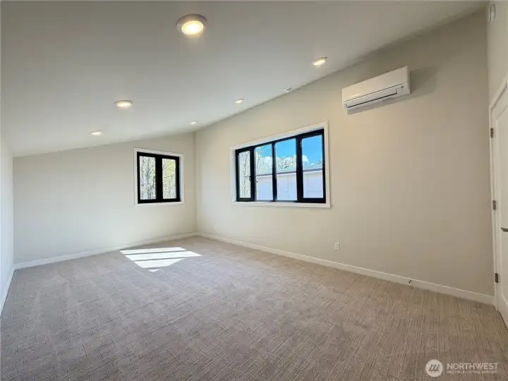 Upstairs bonus space with tons of natural lighting