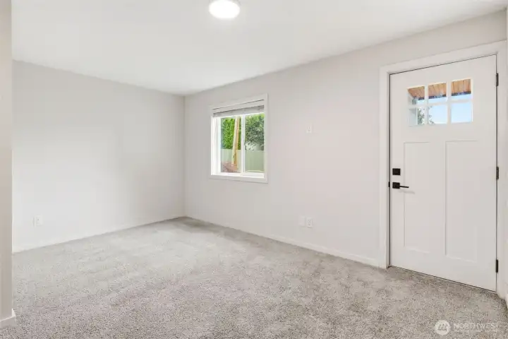 BONUS ROOM - with a door that leads out to the back yard.