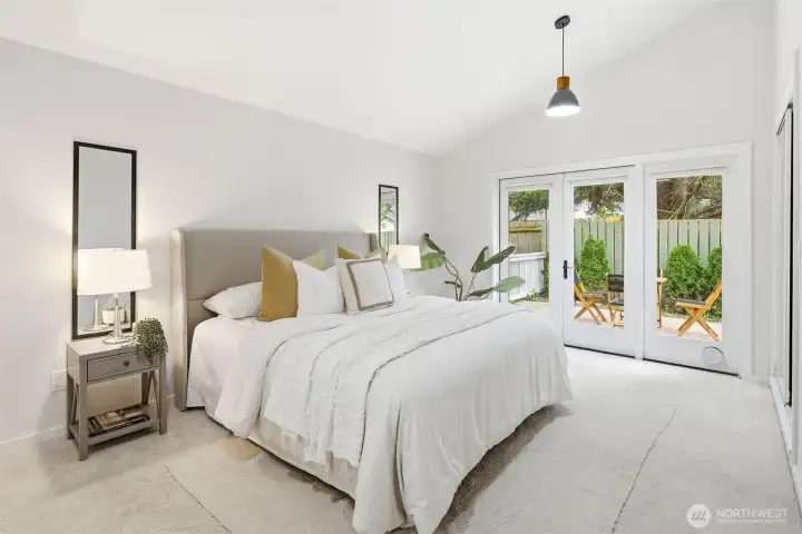 Primary Bedroom with French doors.