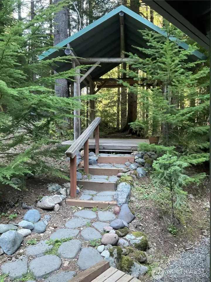 Distinctive gazebo constructed from logs sourced directly from the property, adding authentic character and a meaningful connection to the land. Distinctive gazebo constructed from logs sourced directly from the property, adding authentic character and a meaningful connection to the land.