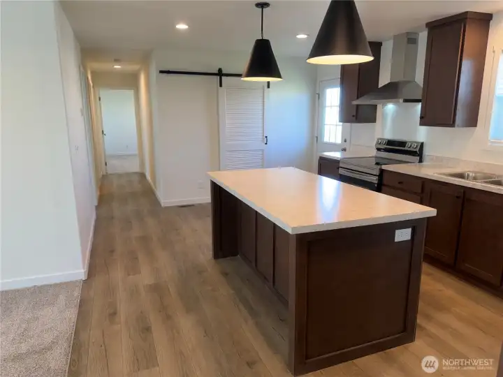 Kitchen looking toward dining/flex room.