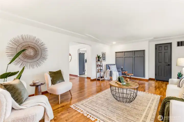 Designed with flow in mind, the living room opens effortlessly to the dining room and adjoining spaces, making everyday living and entertaining a breeze.