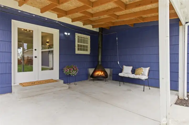 Gather around the outdoor fireplace and enjoy a covered patio designed for year-round entertaining and relaxing evenings at home.