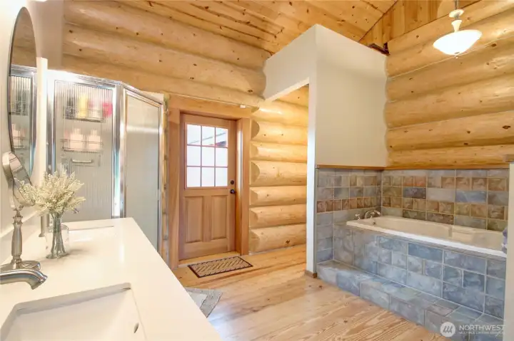 Spa-inspired bathroom with room to relax and recharge.