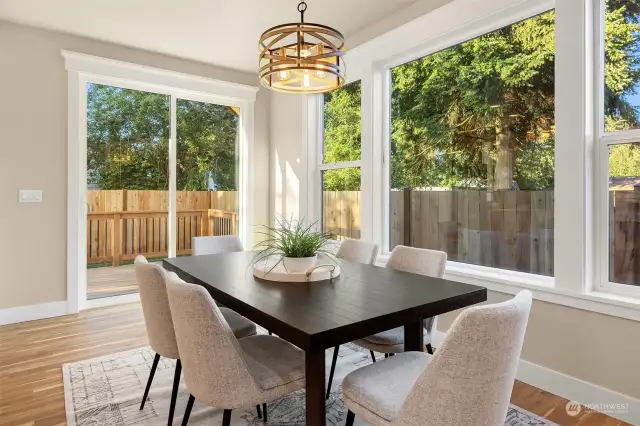 Dining room off the kitchen and deck with lots of natural light