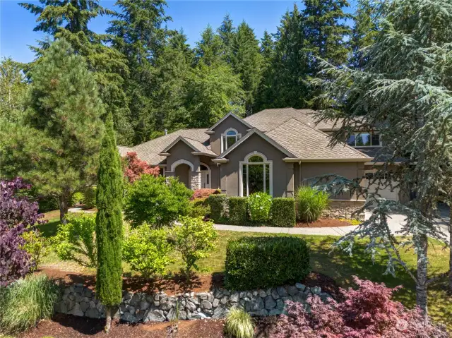 Welcome to 5224 Saddle Back Dr NW.  Stunning Canterwood home situated on a 19,866 sqft private lot.