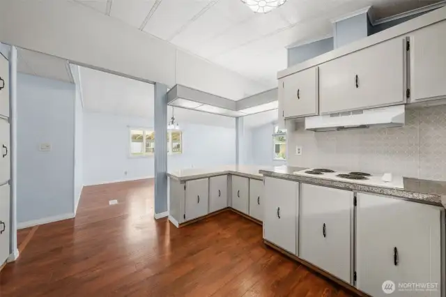 Kitchen opens to dining room.