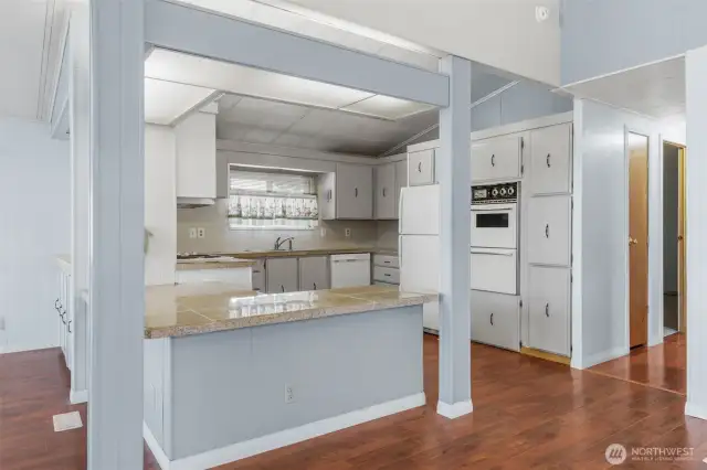 Kitchen with lots of cabinets.