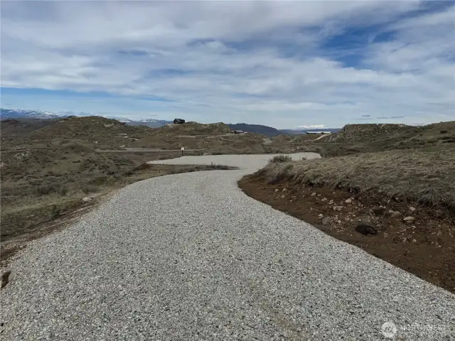 Gravel road to building pad