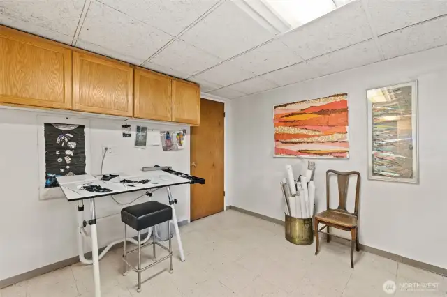 Perfect crafting area, workout space, or office.  That door leads to a fantastics workshop area.