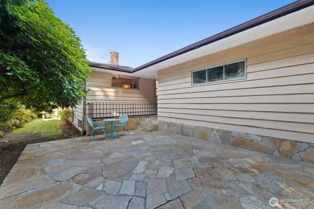 A fantastic patio space behind the house creates another gathering opportunity.