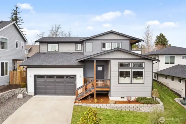 Welcome to 2080 Bakerscape. Better than new home perched up to enjoy expansive views.