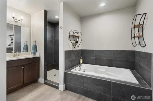 Primary Suite includes a soaker tub for prime relaxation