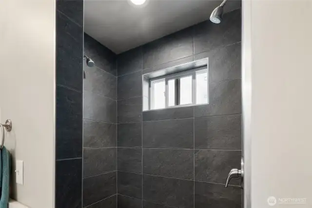 Luxurious dual headed shower in the Primary Suite
