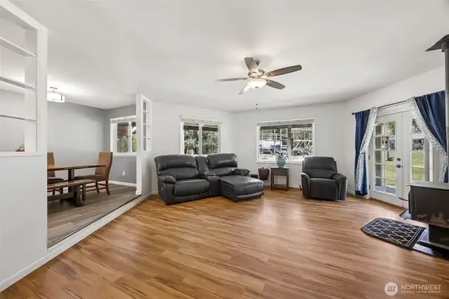 Sunken living room is north facing and with ceiling fan keeps you cool in the summer!