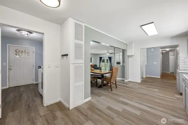 Utility room and exterior door leading to BBQ gazebo just outside.