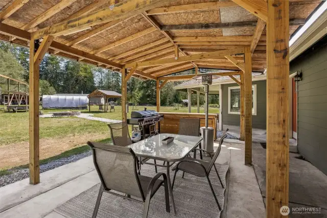 BBQ gazebo just off utility room with firepit just beyond!