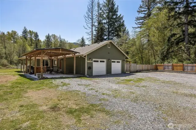 Plenty of driveway parking and true, 2 car garage. RV parking with hook ups and wired for generator!